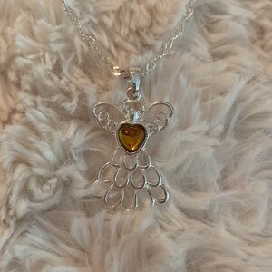 Avon Angel necklace with November birthstone